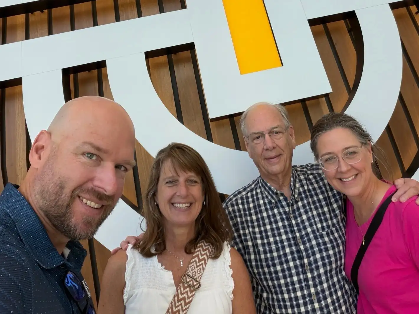 Jeremy Dys, Amy Torrans, Peter Dys, and Lori Hogsed together